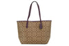 Coach City boysenberry tote on white background