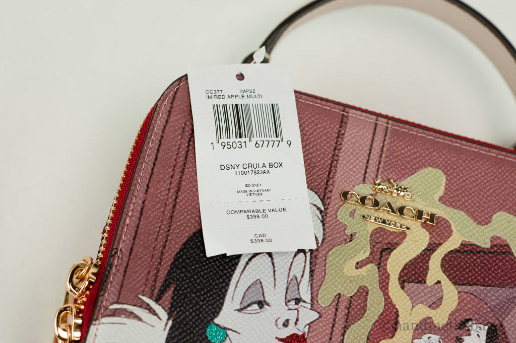 Coach X Disney Cruella box crossbody tag on white background
