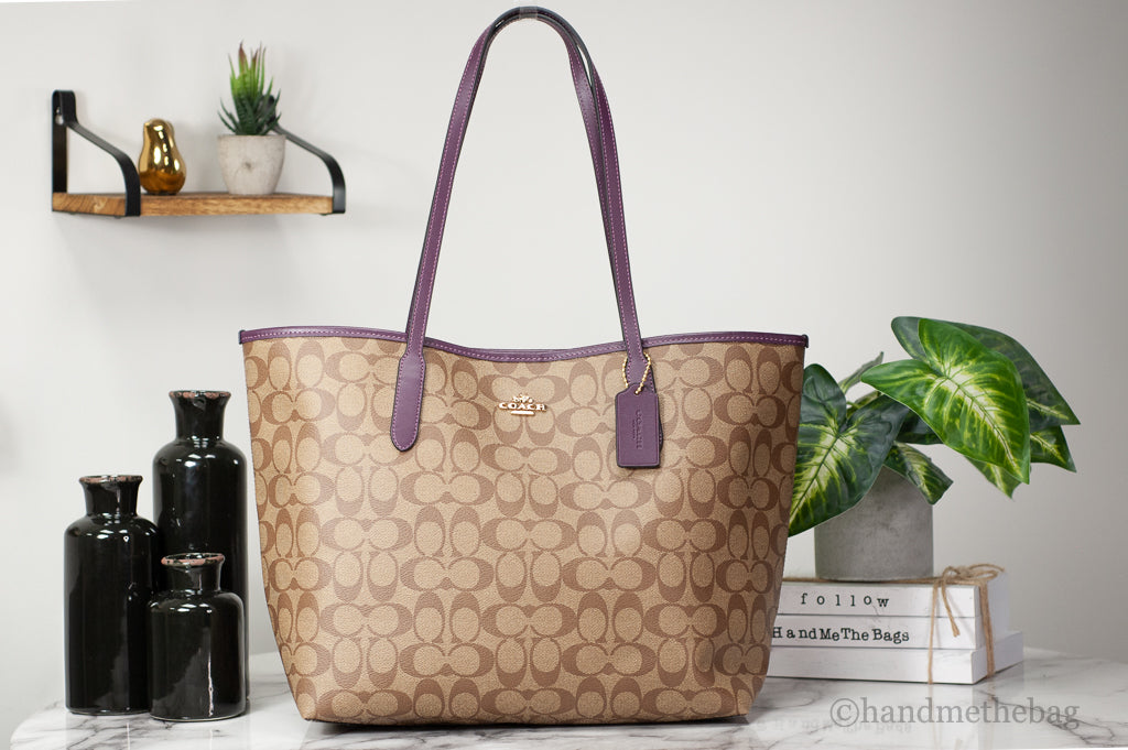 Coach City boysenberry tote on marble table