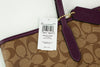 Coach City boysenberry tote tag on white background