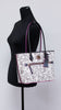 Dooney & Bourke Minnie Mouse line art tote on mannequin