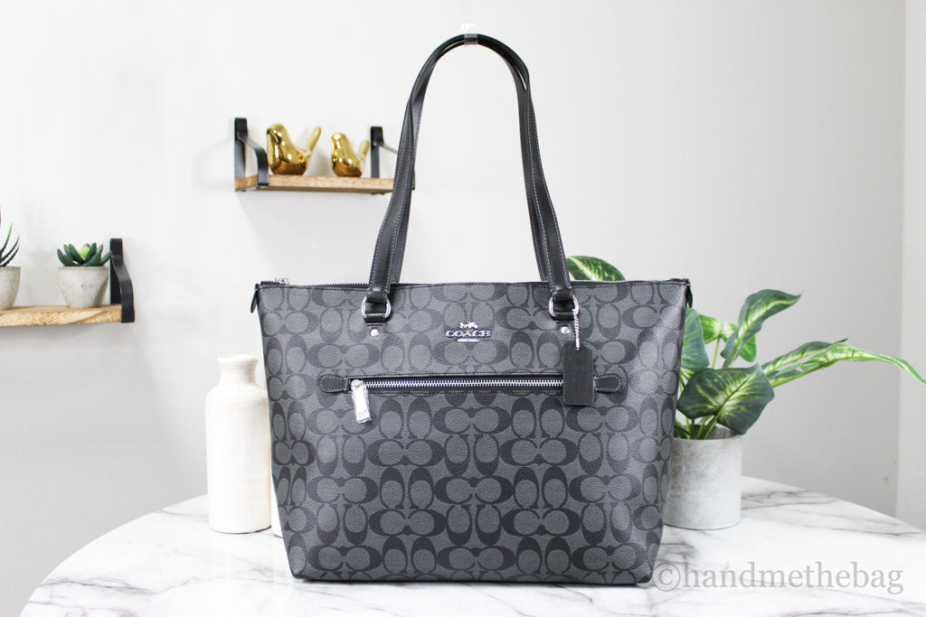 Coach Gallery graphite black tote on marble table