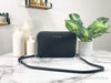 Michael Kors black solid silver east west crossbody bag front on marble table