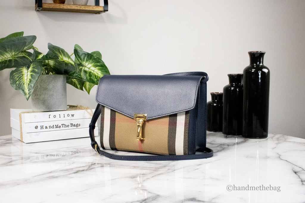 burberry macken ink blue house check crossbody on marble table