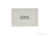 Alexander McQueen wallet box on white background