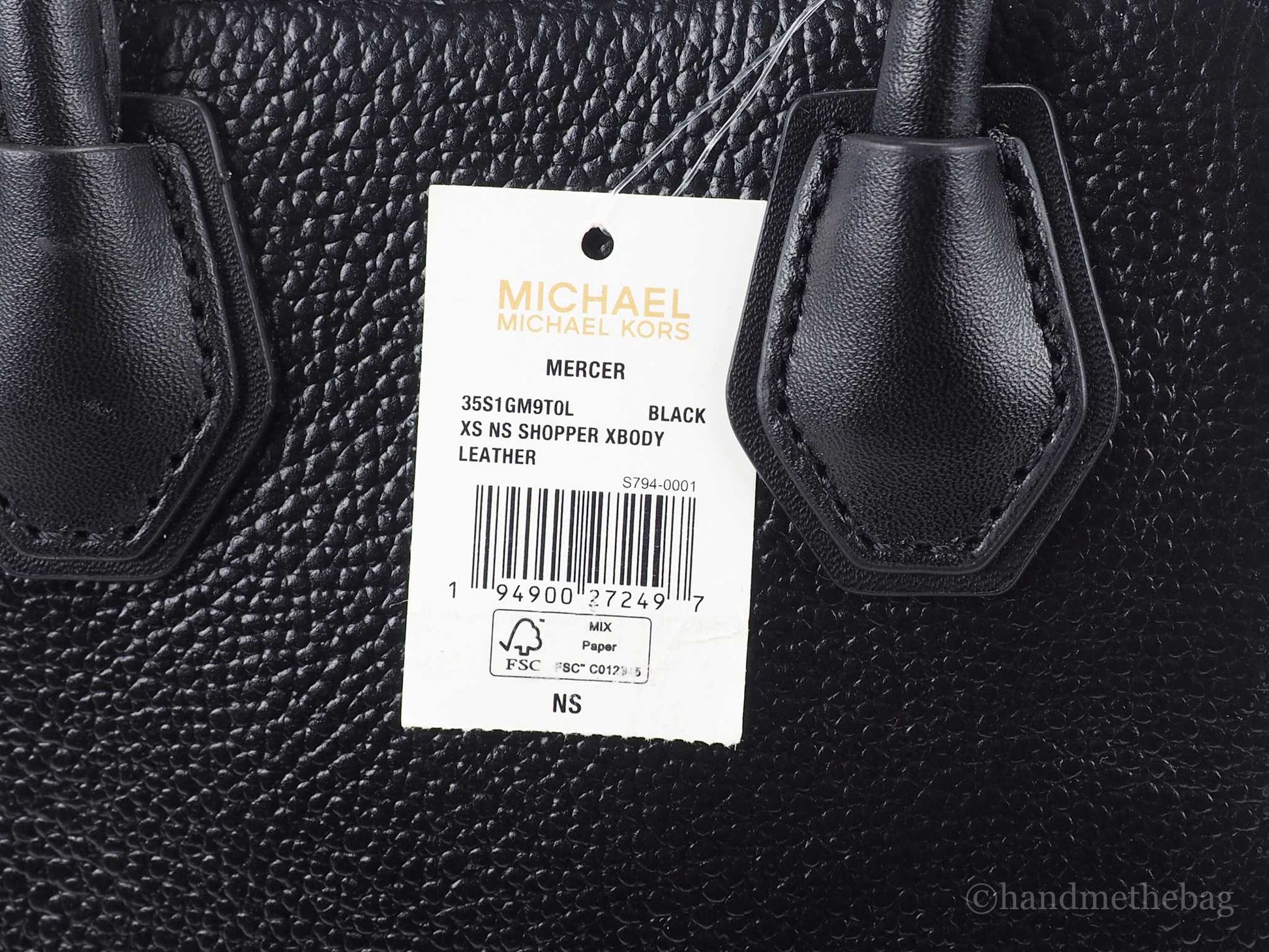 Michael Kors mercer black north south shopper bag tag on white background