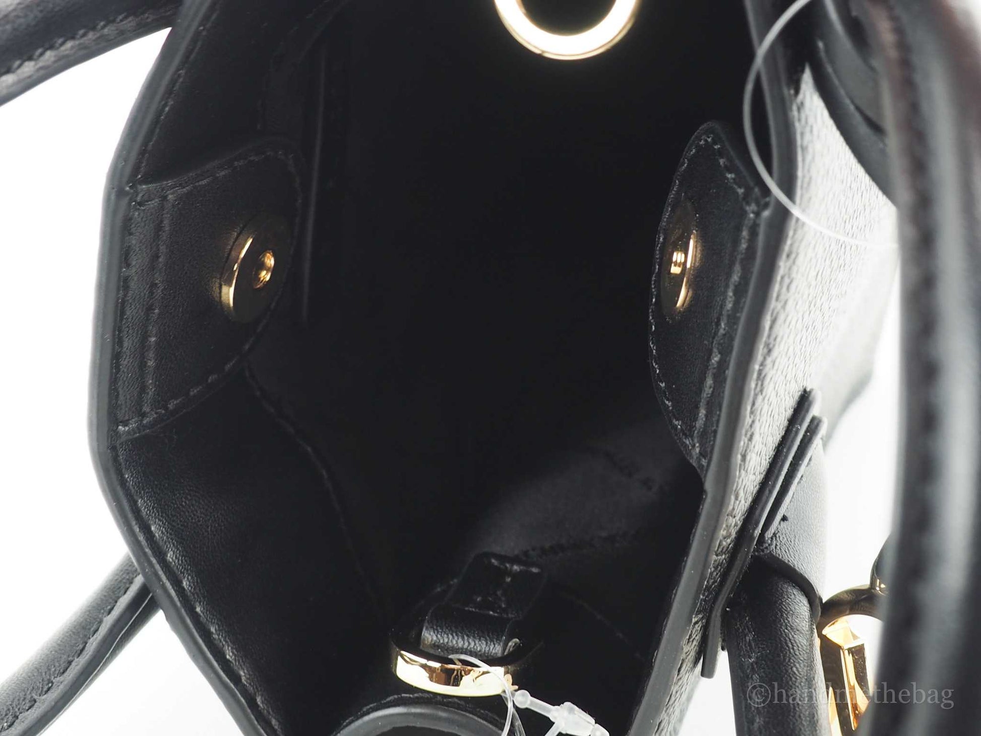 Michael Kors mercer black north south shopper bag inside on white background