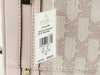 Michael Kors Jet Set powder blush trunk crossbody tag on white background