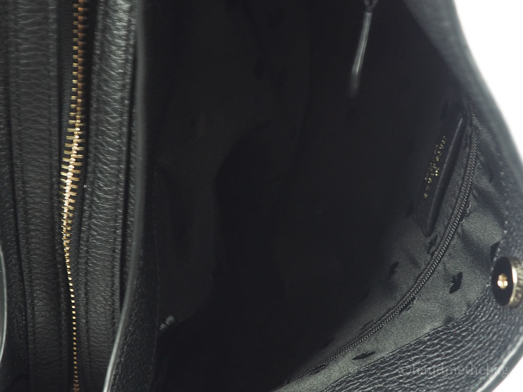 Kate Spade Leila black triple compartment satchel inside on white background