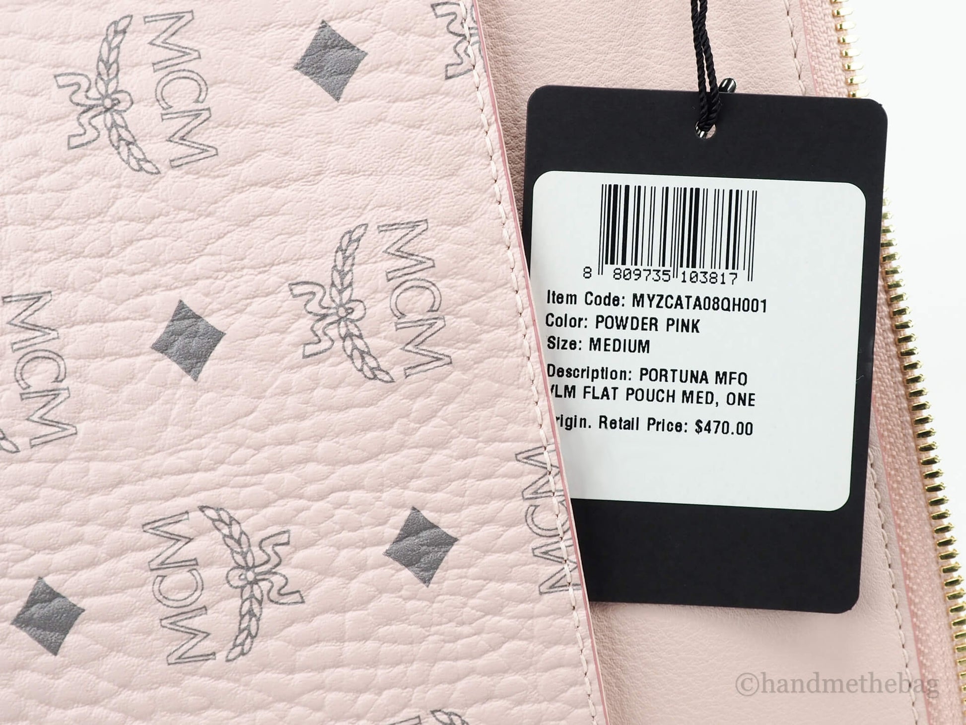 MCM portuna powder pink flat pouch tag on white background