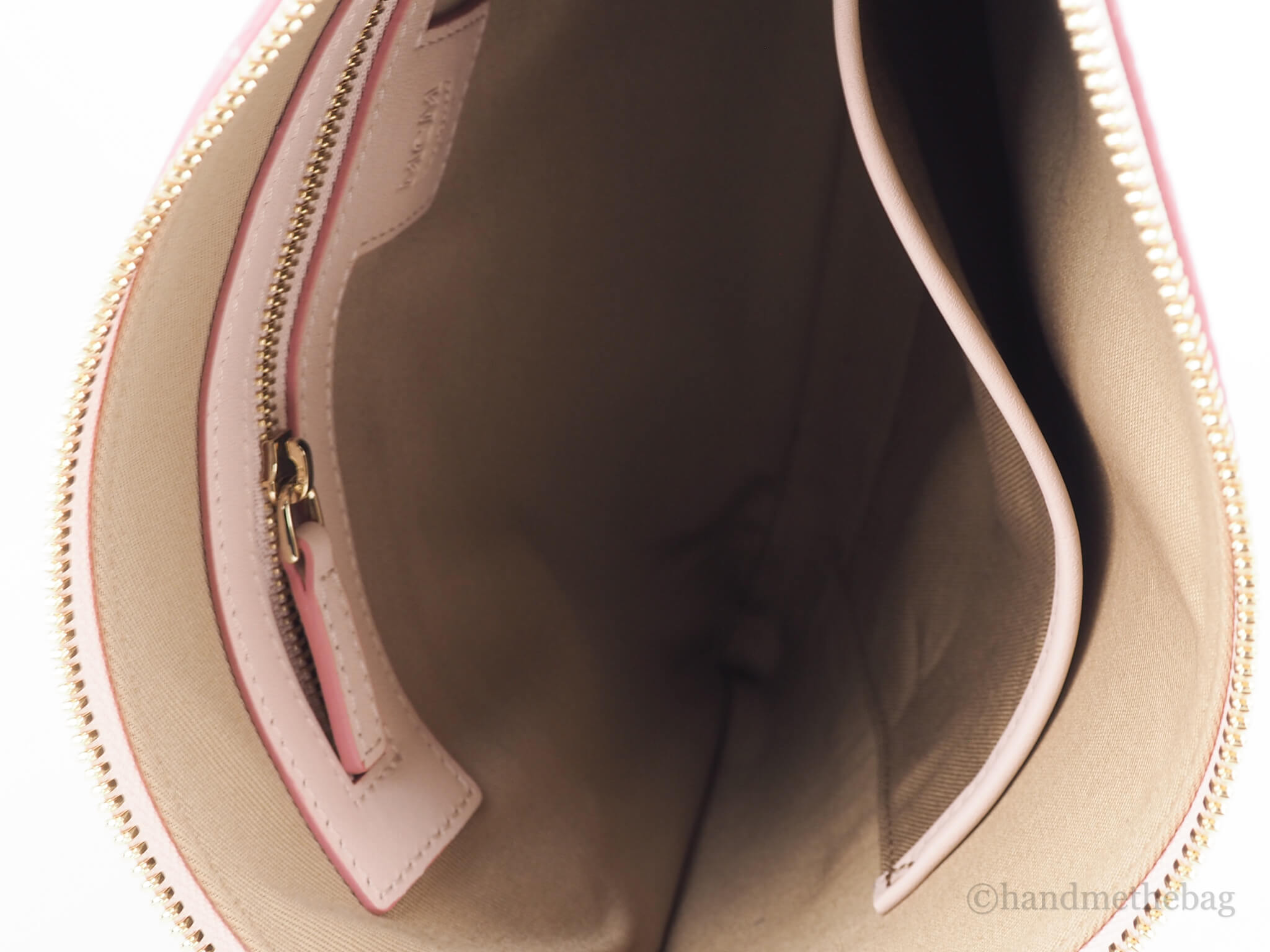 MCM portuna powder pink flat pouch inside on white background