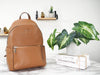 Kate Spade leila gingerbread dome backpack on marble table