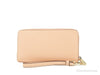 Coach faded blush long zip around wallet back on white background