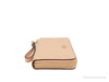 Coach faded blush long zip around wallet side on white background