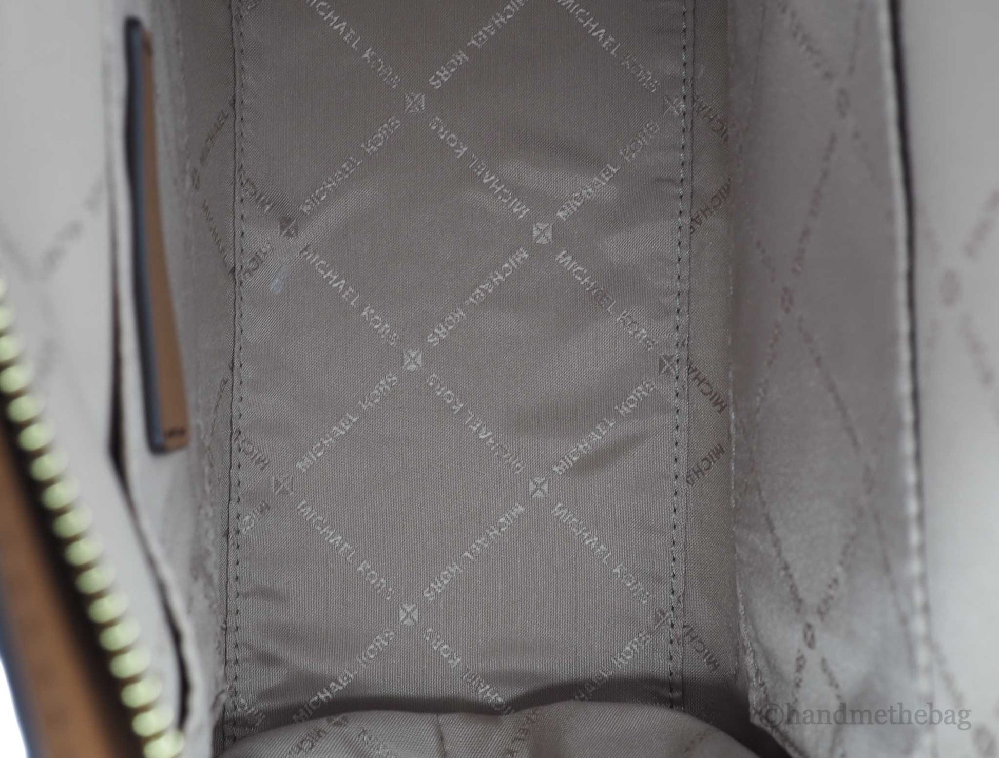 Michael Kors avril brown pvc satchel bag inside on white background