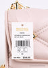 Michael Kors Serena powder blush vegan crossbody tag on white background