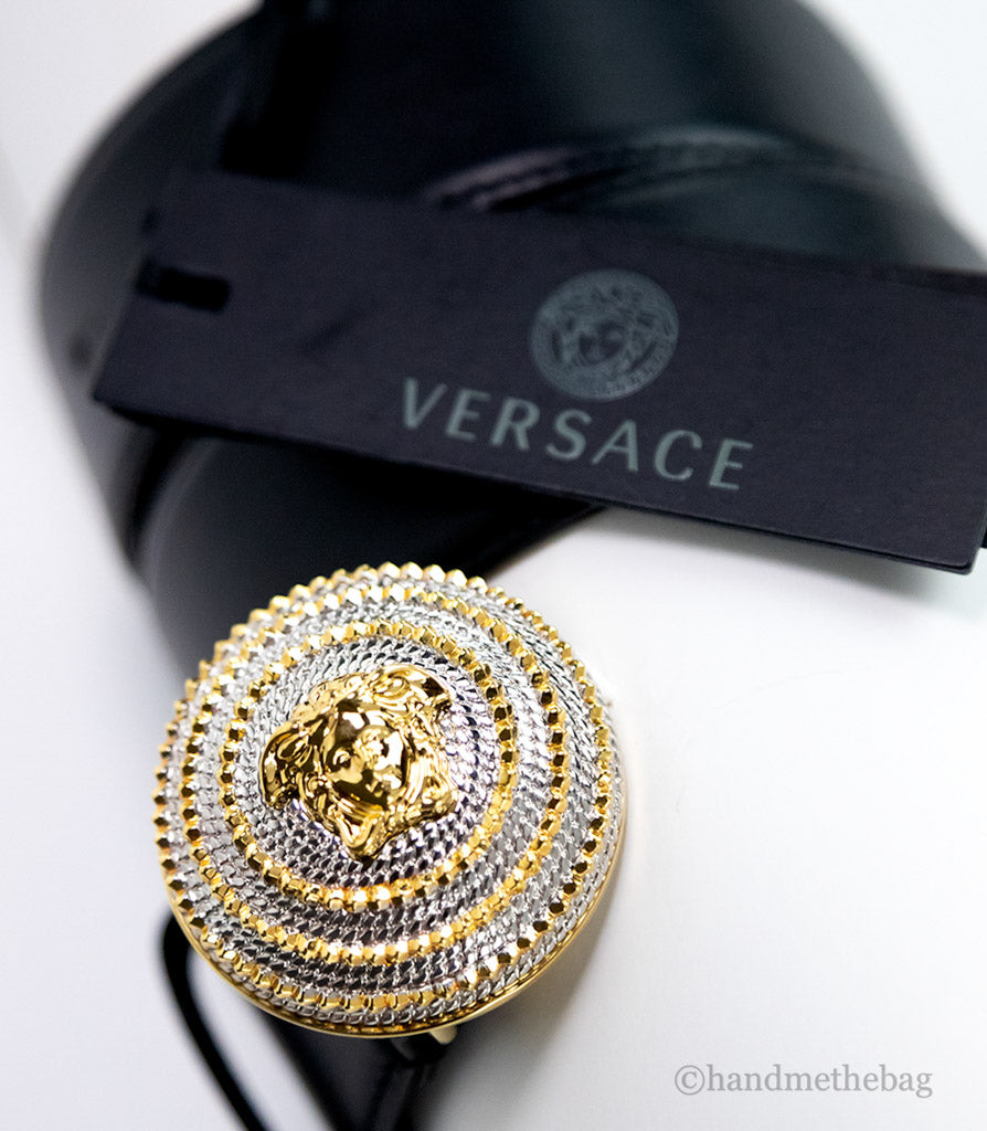 Versace Round Medusa buckle belt on white background