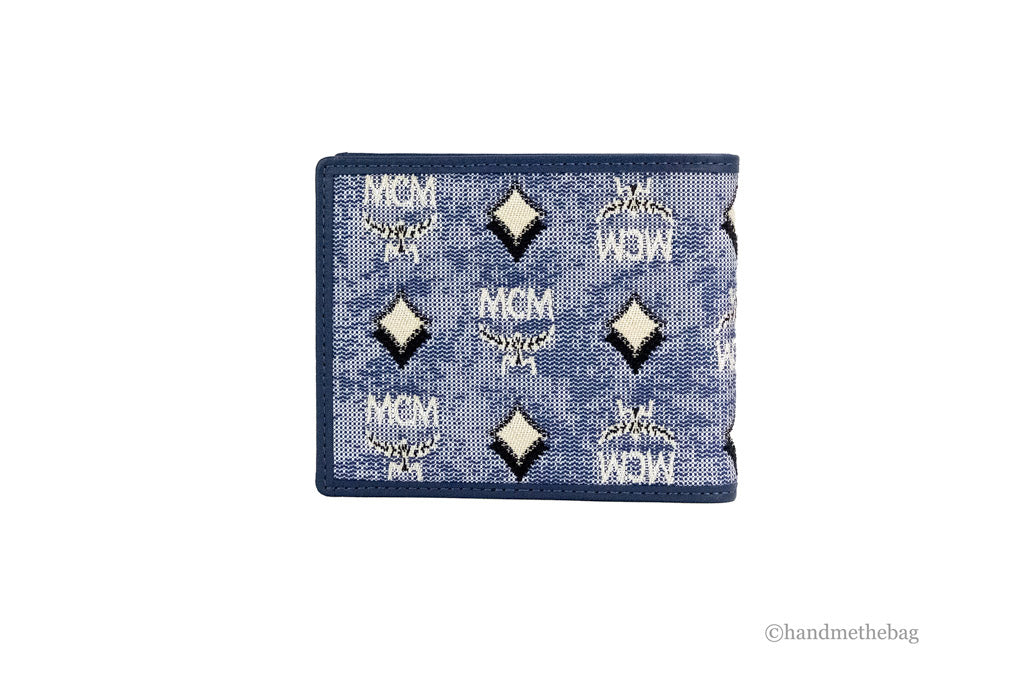 mcm veritas antique denim blue bifold wallet back on white background