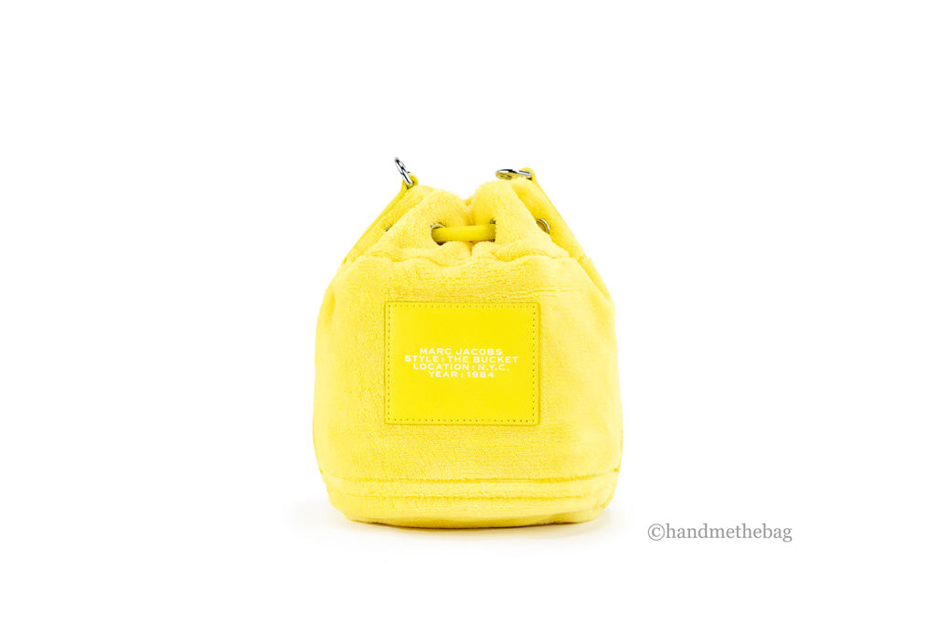 marc jacobs the terry mini bucket bag yellow back on white background