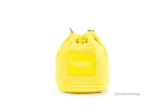 marc jacobs the terry mini bucket bag yellow back on white background