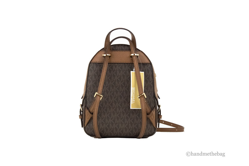 michael kors xs jaycee brown backpack back on white background