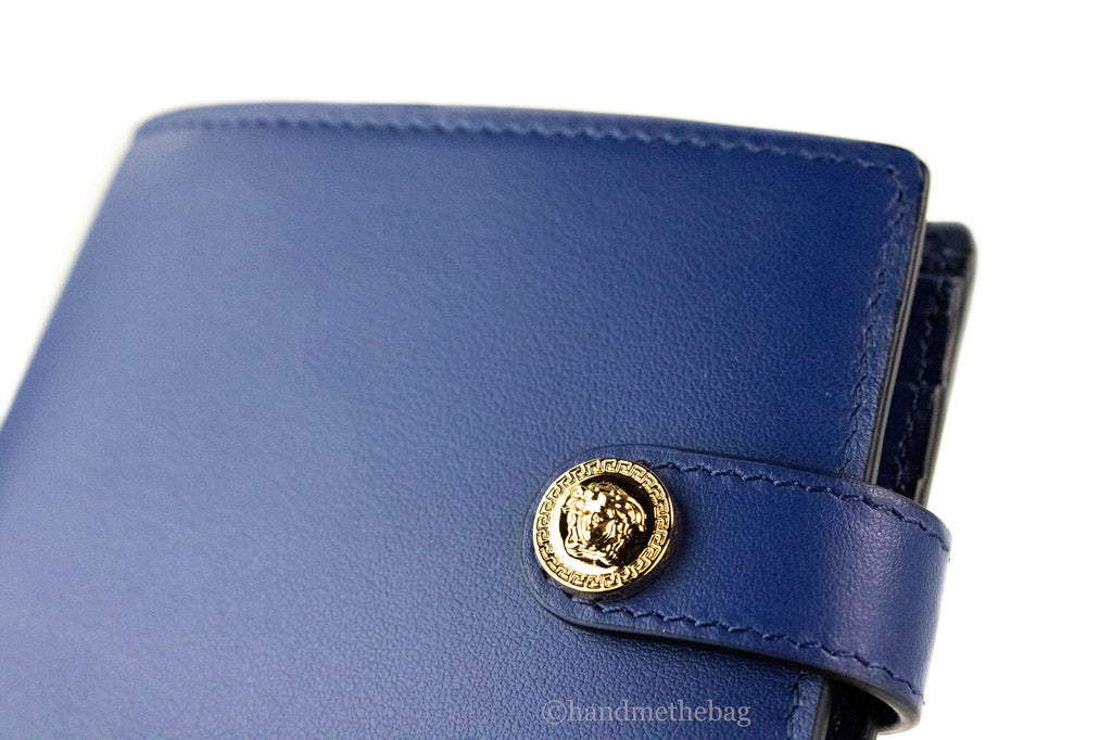versace navy blue compact bifold wallet detail on white background