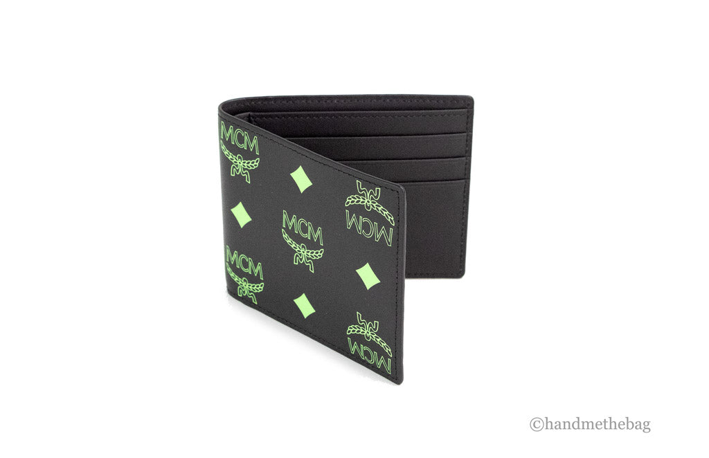 mcm color splash summer green bifold wallet angled on white background