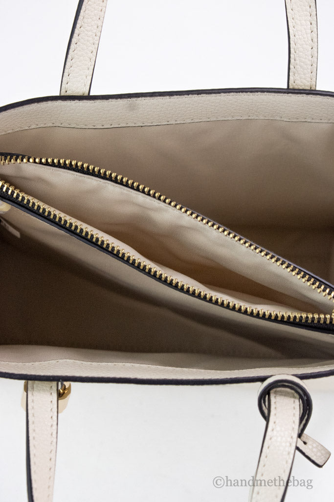 marc jacobs x peanuts woodstock tote inside on white background