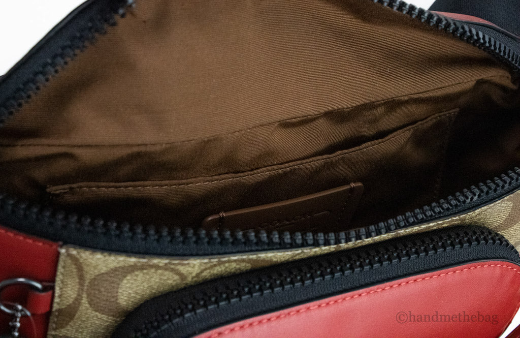 coach colorblock red track belt bag inside on white background