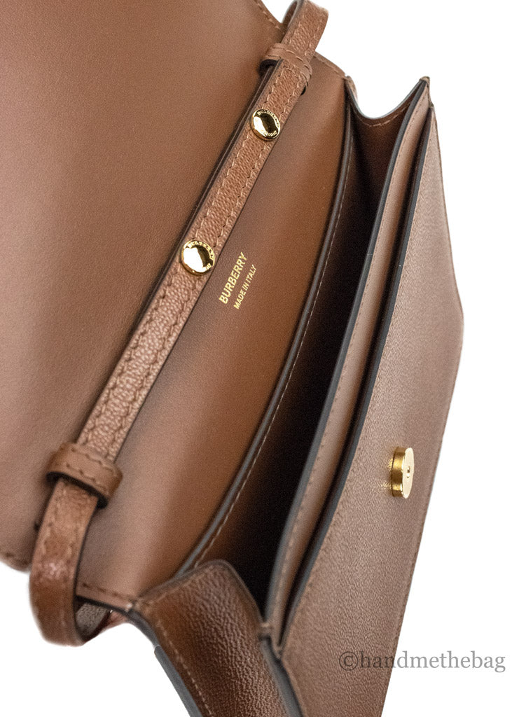 burberry hampshire small tan crossbody inside on white background