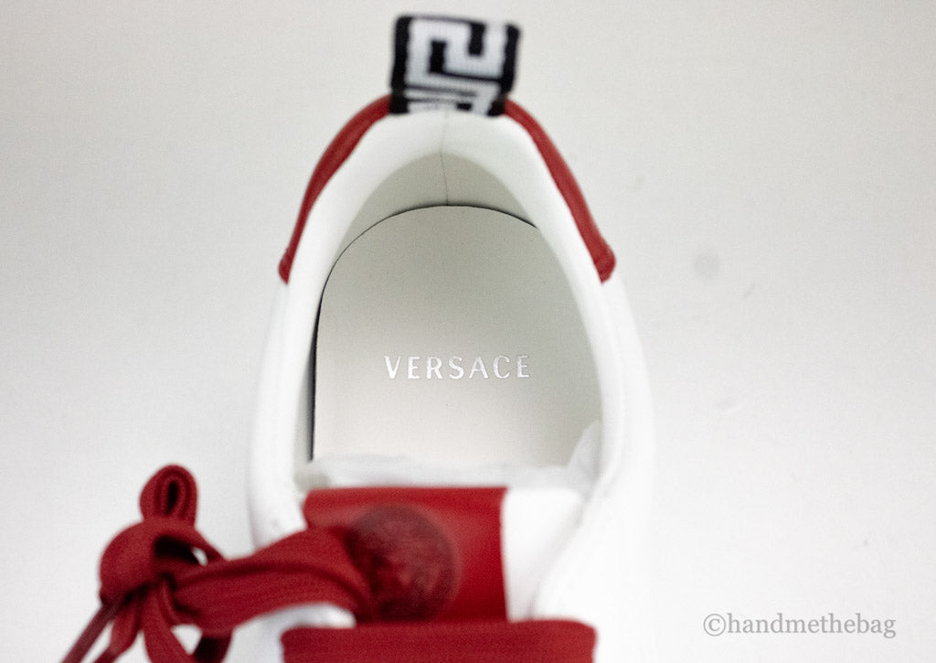 gianni versace deep red sneakers inside on white background