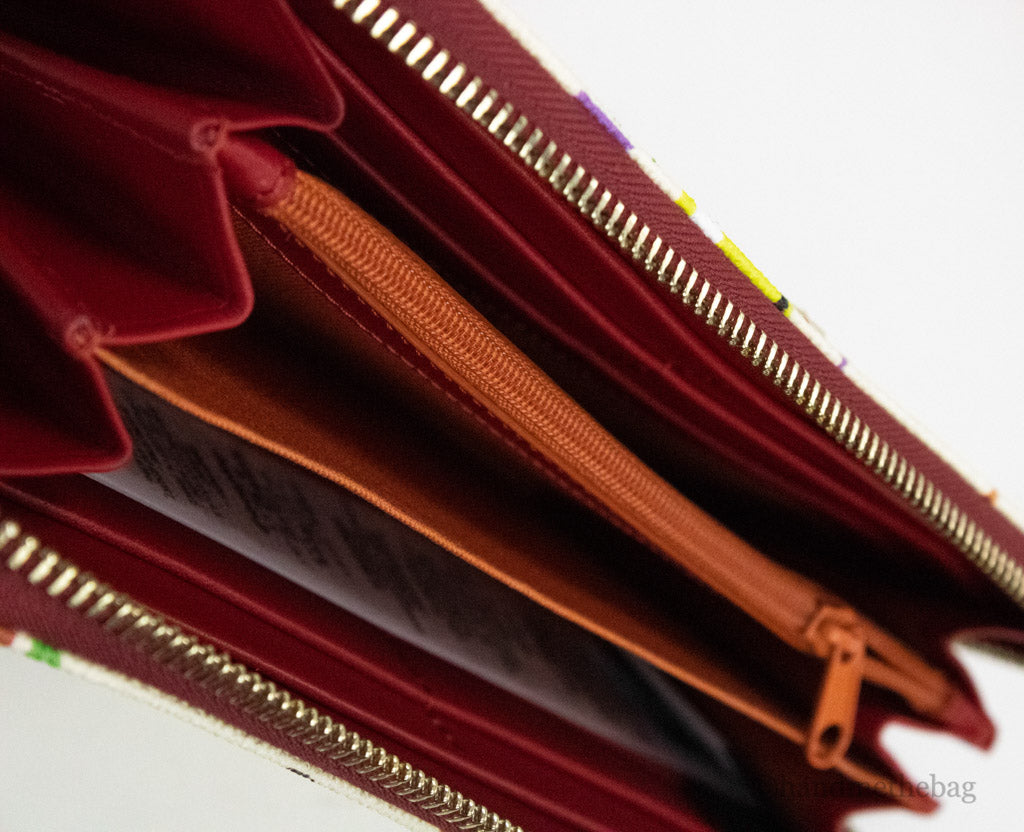 dooney and bourke snow white 85th anniversary wallet inside on white background