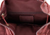 coach dempsey red apple canvas backpack inside on white background