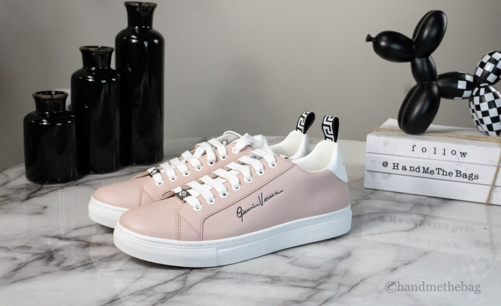 gianni versace powder blush sneakers on marble table