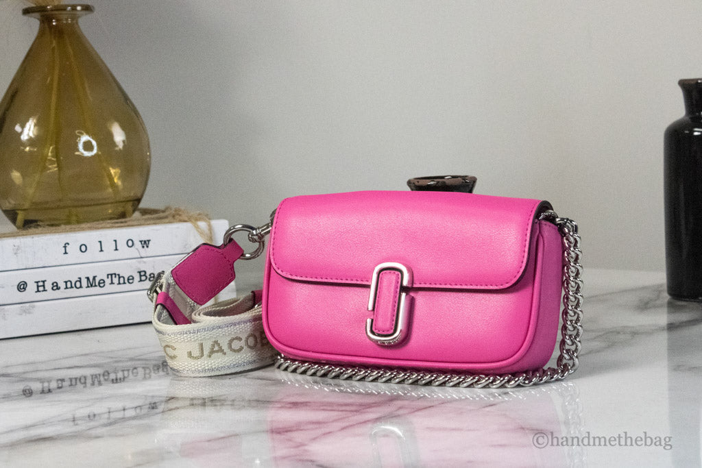 marc jacobs the j marc magenta shoulder bag on marble table