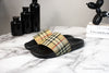 burberry furley slides on marble table
