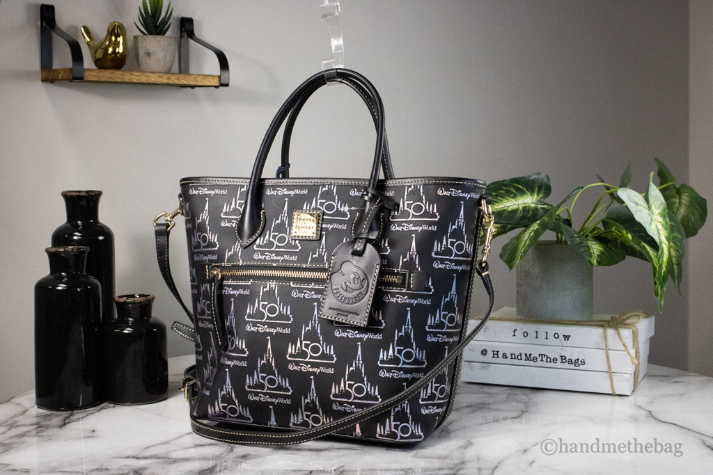 dooney and bourke walt disney world 50th anniversary tote on marble table