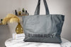 burberry trench charcoal grey econyl tote on marble table