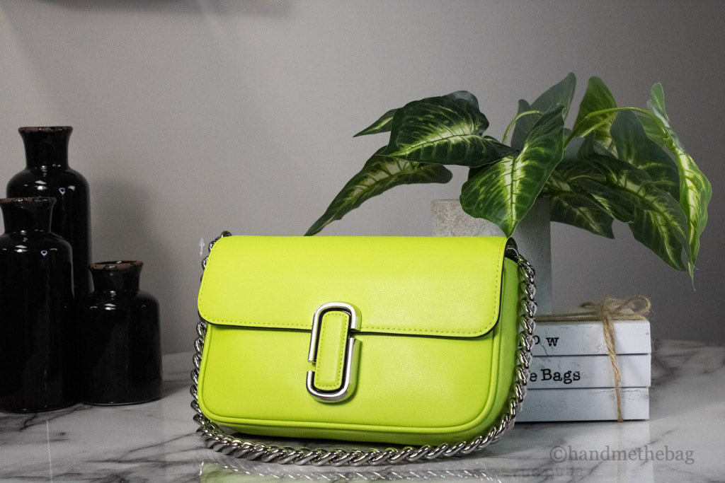 marc jacobs the j march shoulder bag green glow on marble table