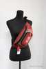 coach colorblock red track belt bag on mannequin