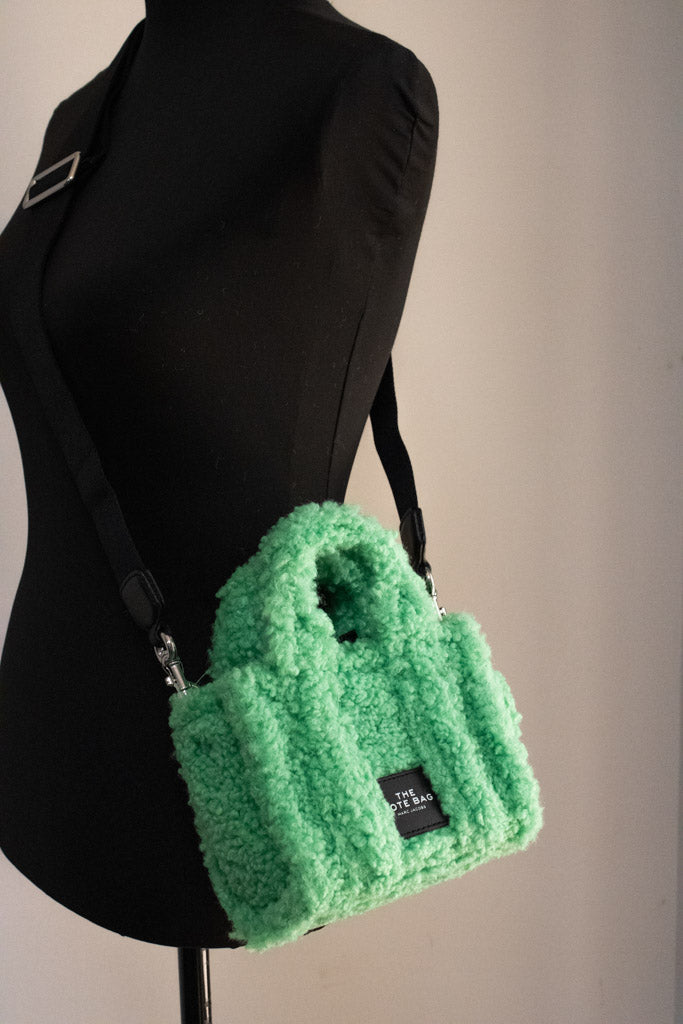 marc jacobs the teddy micro fluffy green tote bag on mannequin