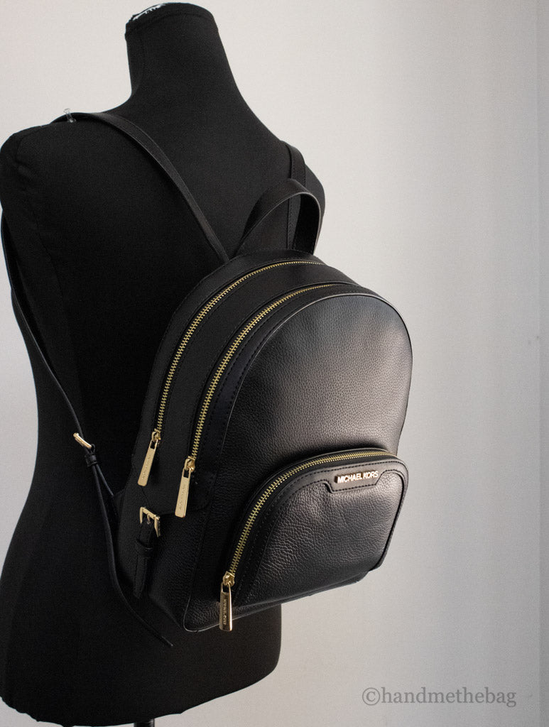 michael kors jaycee medium black backpack on mannequin