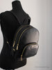 michael kors jaycee medium black backpack on mannequin