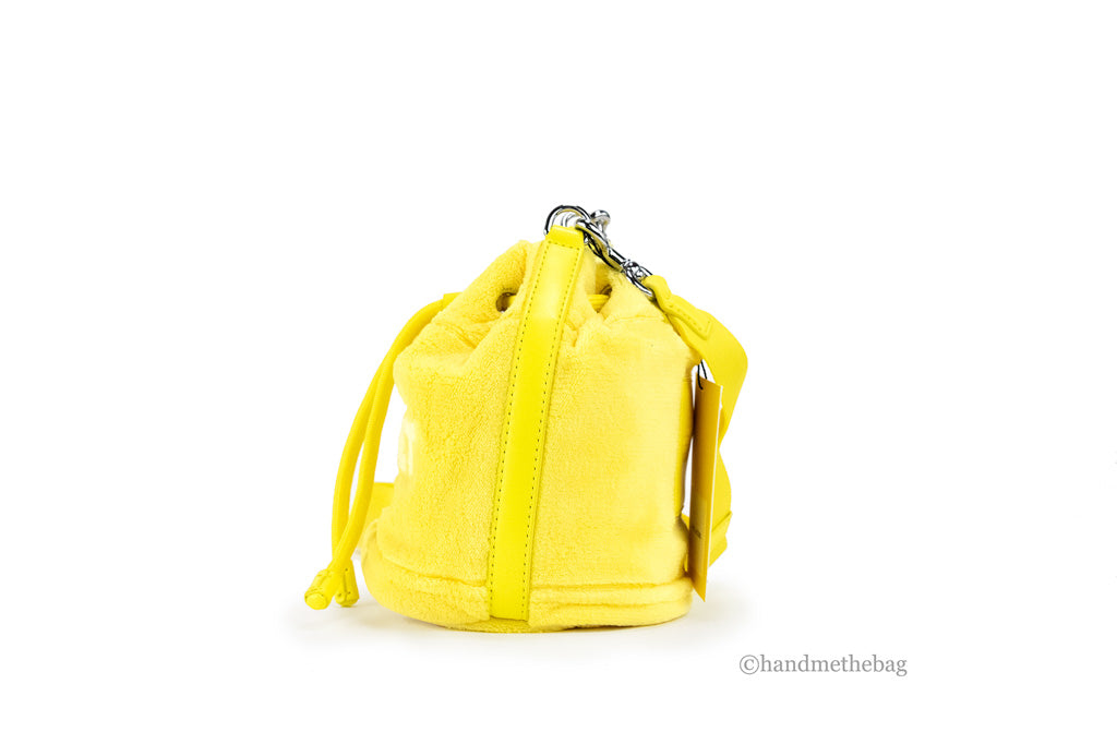 marc jacobs the terry mini bucket bag yellow side on white background