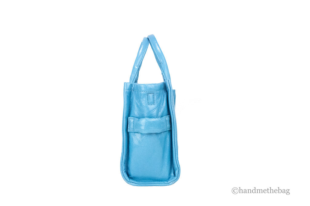 marc jacobs the shiny crinkle mini tote air blue side on white background