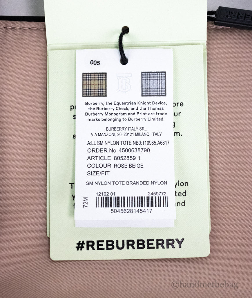 burberry rose beige nylon tote tag on white background