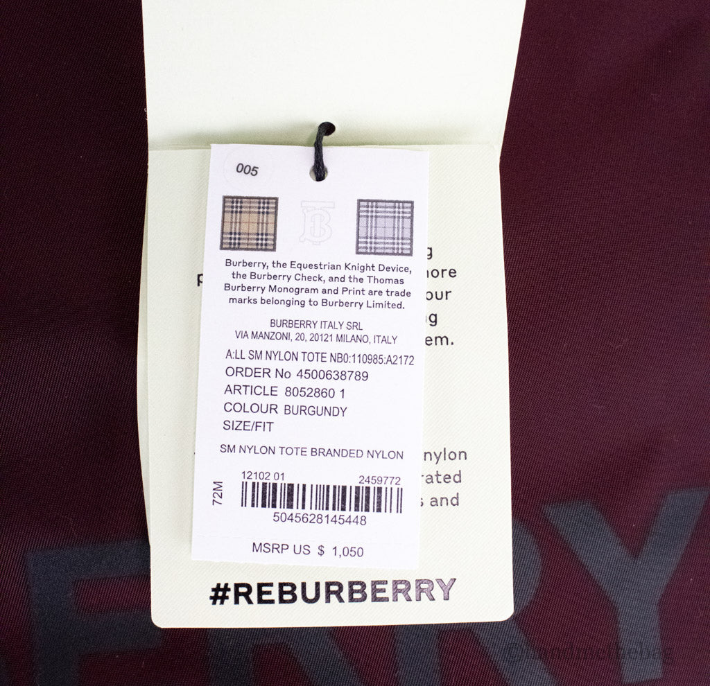 burberry burgundy nylon tote tag on white background