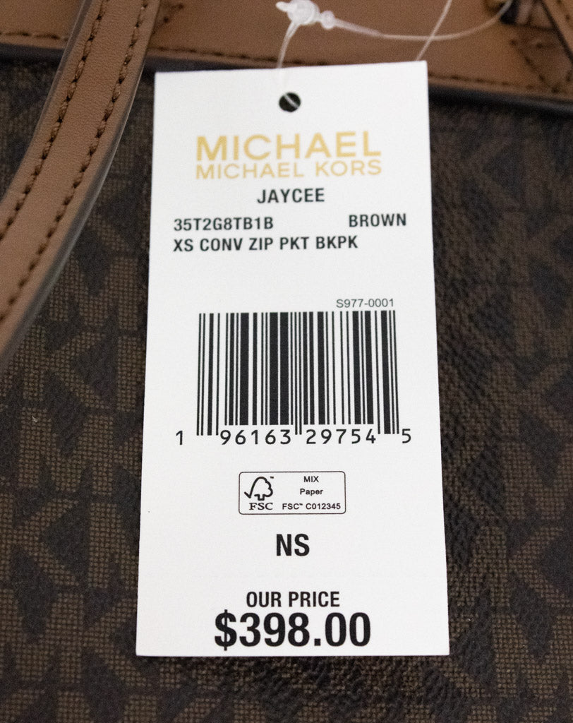 michael kors xs jaycee brown backpack tag on white background
