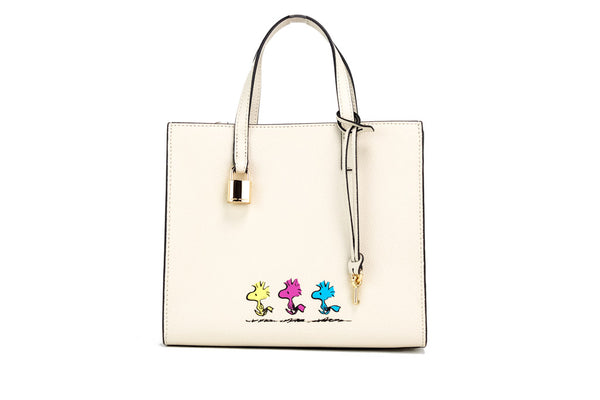 marc jacobs x peanuts woodstock tote on white background