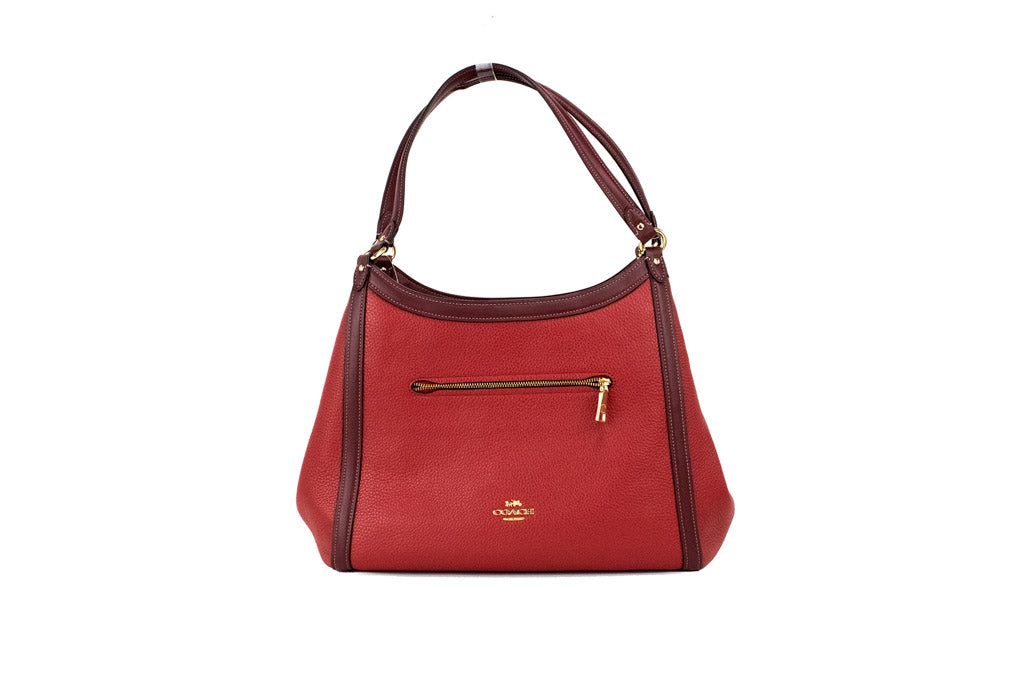 coach kristy red apple shoulder bag on white background